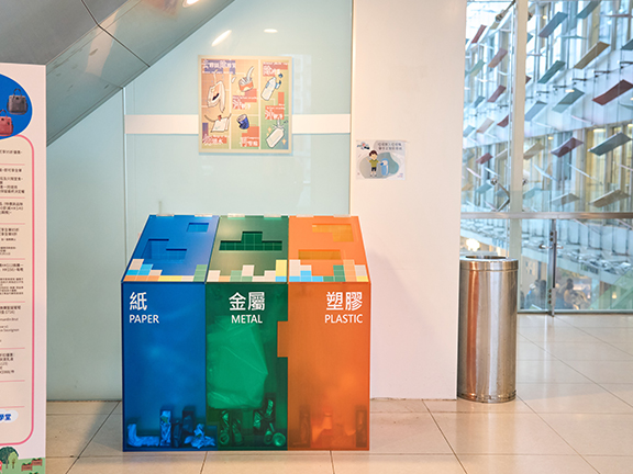 The translucent bins and the placement of recycling samples would encourage people to follow suit and dispose of recyclable items. 