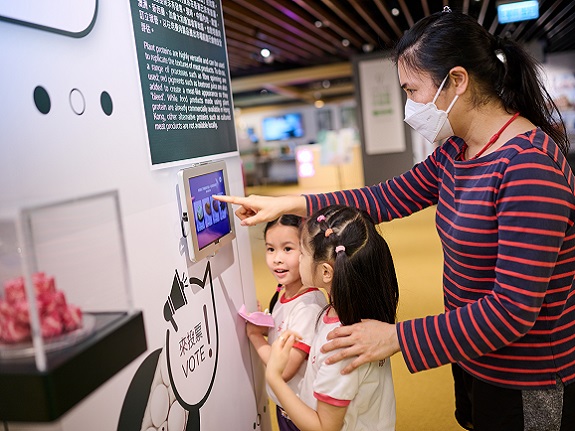 Ms Yee shows the girls how they can do more to protect the environment.