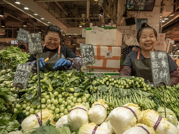 The genuine smiles of market vendors left a deep impression on Sandy.