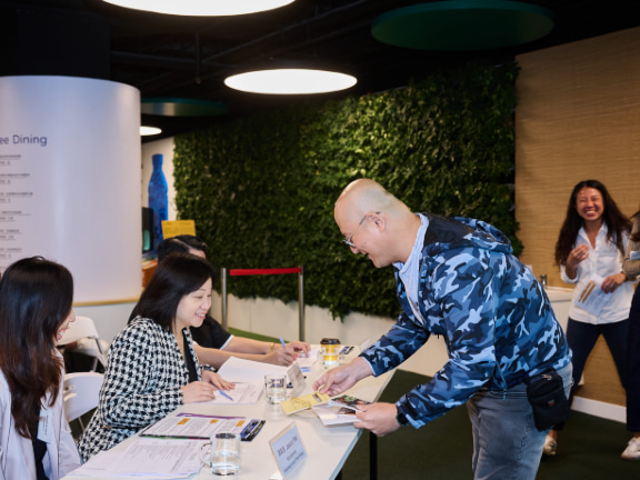 Representatives from the three organisations behind Draw Your Own Legend present their pitch to the judging panel.