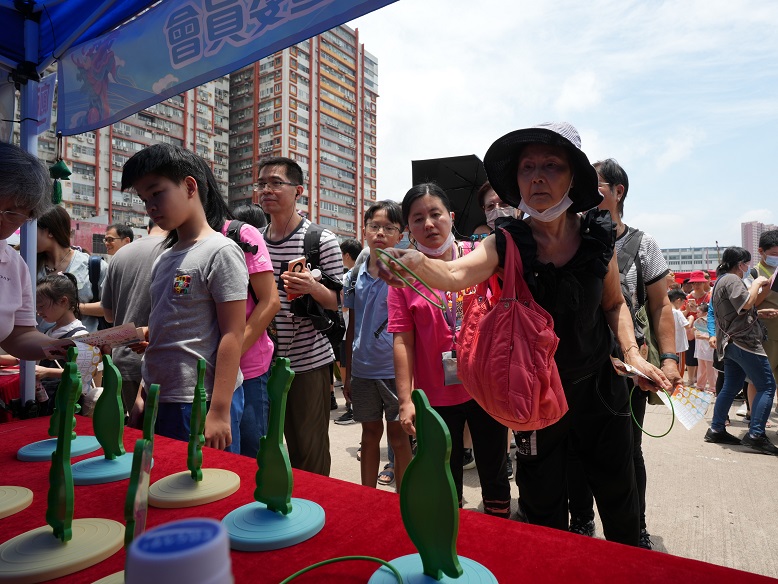 The joyful carnival featured over ten stalls where people can play games and win prizes.