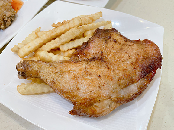 The chicken leg is crispy and golden-brown on the outside, and tender and juicy on the inside.