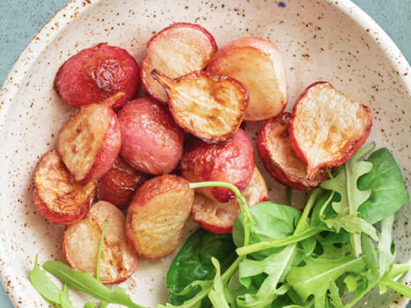 : Baked Cherry Belle radishes with olive oil, salt, pepper, and lemon juice