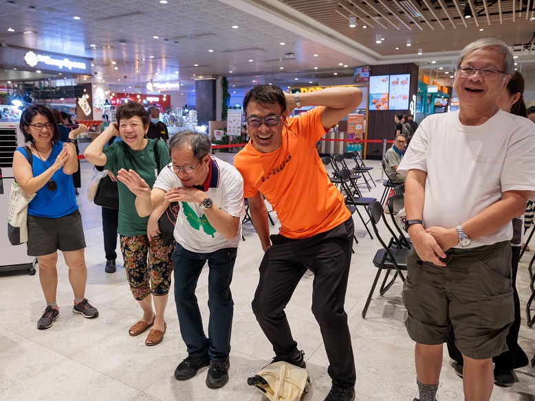 Elderly Singaporeans moved with infectious enthusiasm, creating a joyful atmosphere.
