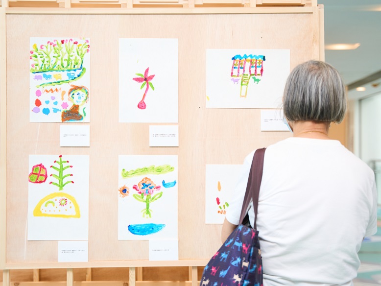 Residents stopped to admire the elderly participants’ artworks.