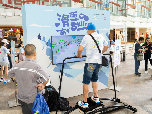 The skiing game challenges players’ agility in both feet.
