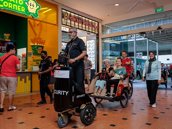 Spotted at Jurong Point for the first time - a procession of trishaws ferrying delighted seniors.