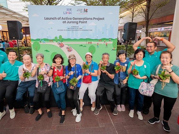 Seniors with the NTUC Health team, showing off the results of their hard work! 