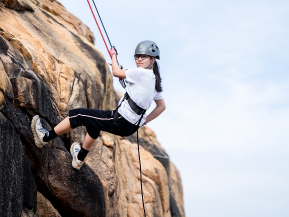 Abseiling requires both technical skill and the courage to overcome the fear of heights.