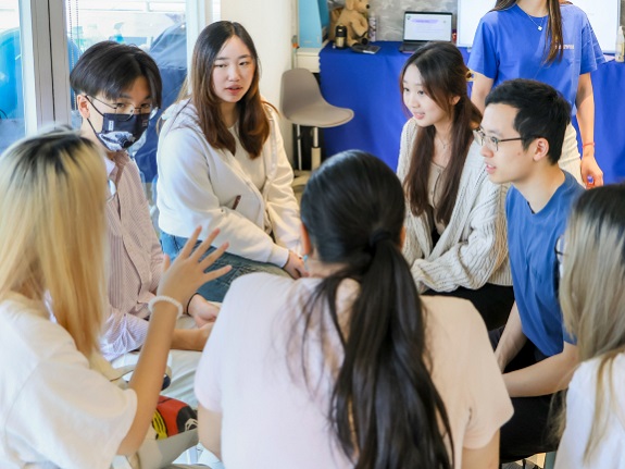 Link University Scholarship recipients serve as assistants to animal-assisted therapists, interacting with SEN youth.