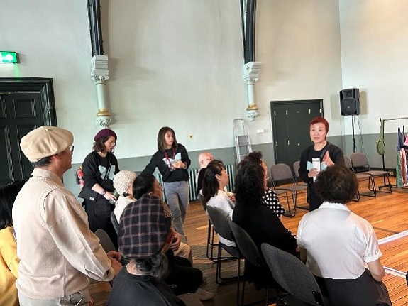 Brenda briefs performers before the UK show.