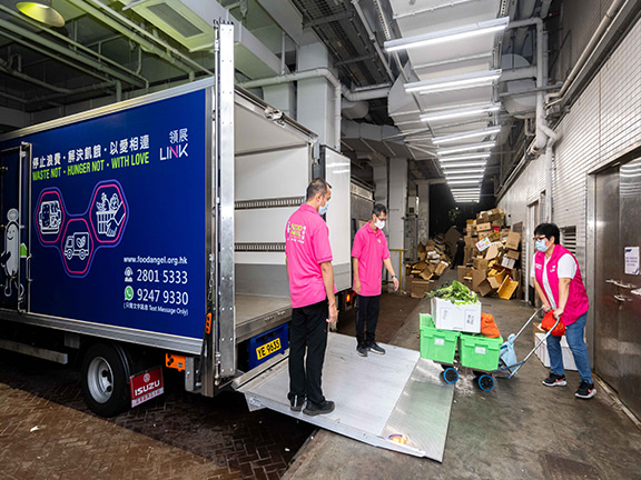 The surplus food would then be loaded onto the truck.