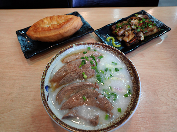 The congee came in a large bowl with generous pieces of pork and assorted pork innards; each mouthful was a different surprise.