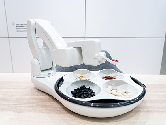 Electric assistive eating device is one of genrontech products in the centre