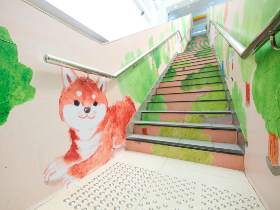 Colourful paintings of animals and nature feature along the east wing staircase of Link’s Tai Wo Plaza.