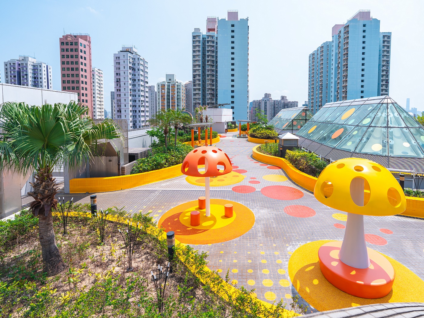 The expanded Adventure Playground now spans more than 34,000 square feet, making it one of the few large-scale outdoor play zones with water features inside a shopping mall in Kowloon.