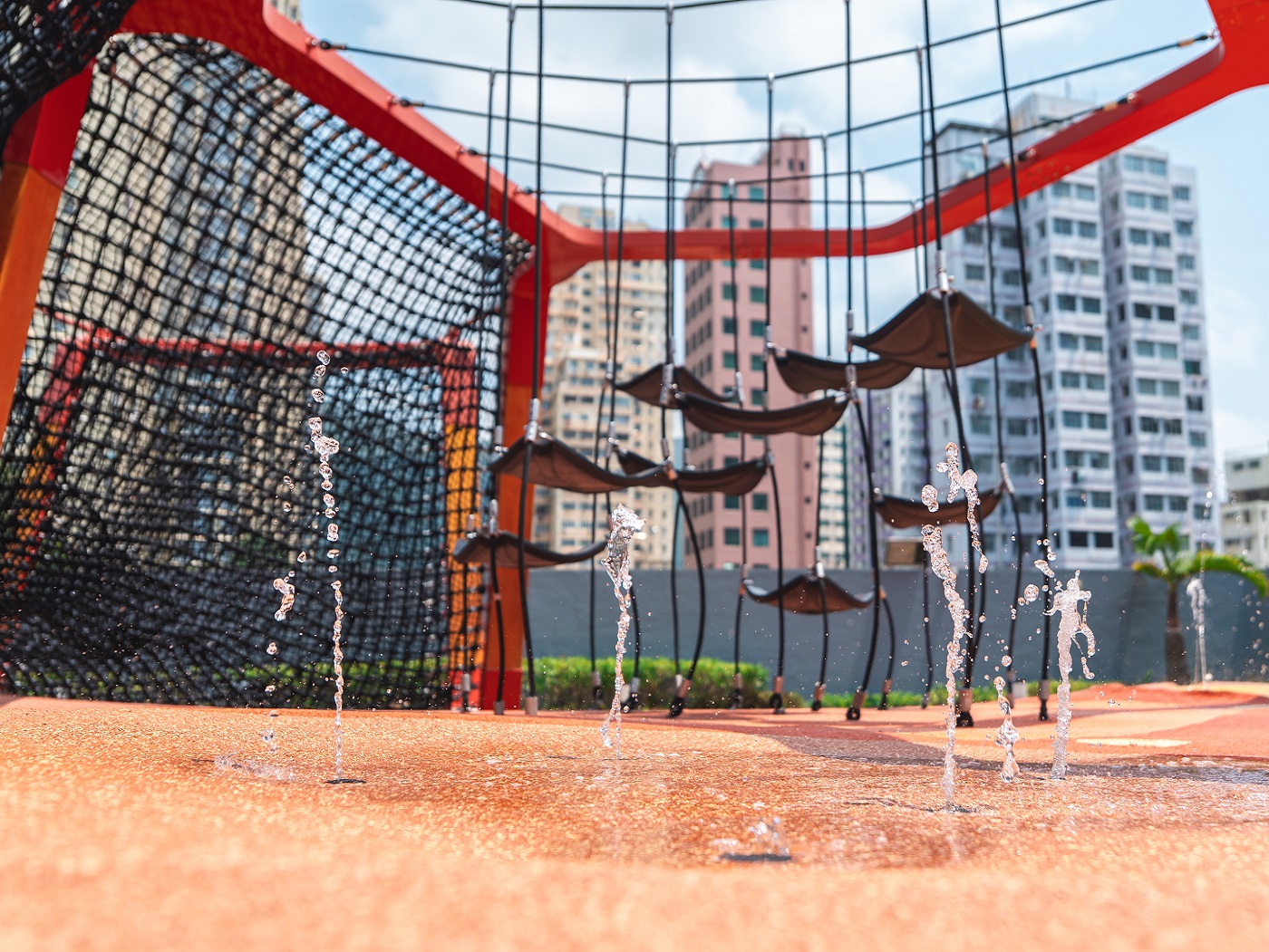 Equipped with water play features, the playground offers a refreshing outdoor escape for children and families during the hot summer months.